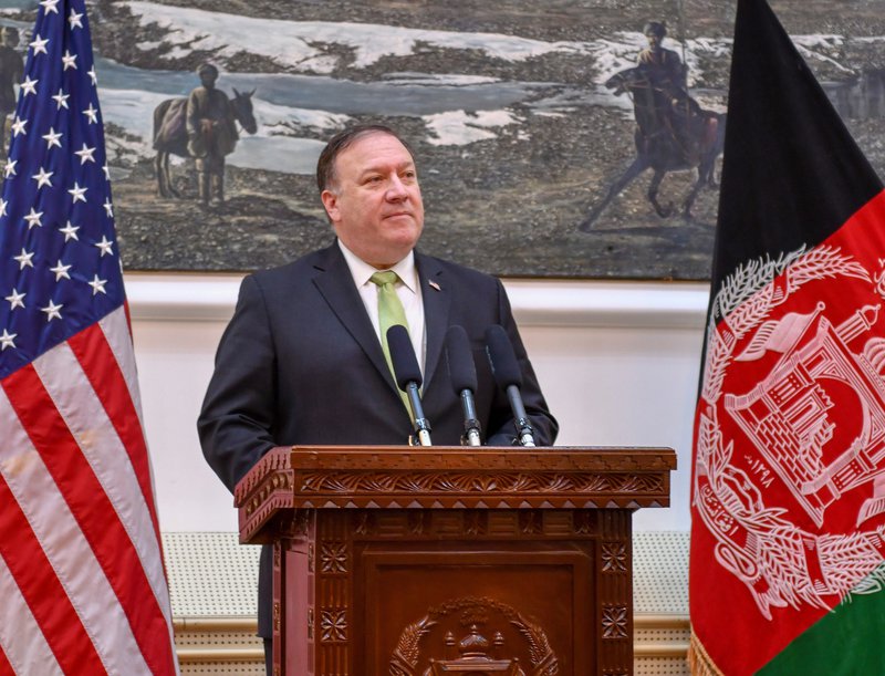 Pompeo on unannounced visit to Afghanistan pledging US support for peace talks with the Taliban, July 2018.