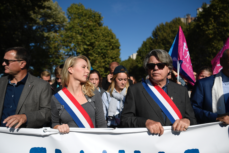 French far-right leaders Marion Maréchal-Le Pen and Gilbert Collard at a demonstration of La Manif Pour Tous in 2016