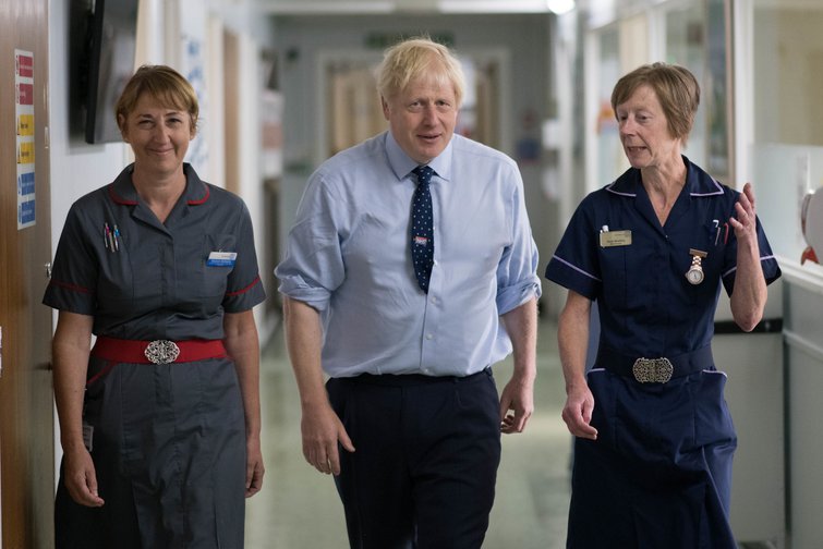 Prime Minister Boris Johnson meets staff during a visit to The Princess Alexandra hospital in Essex,